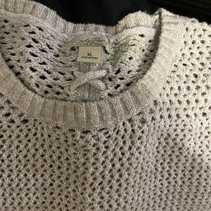 Women's Lucky oatmeal long sleeve sweater.